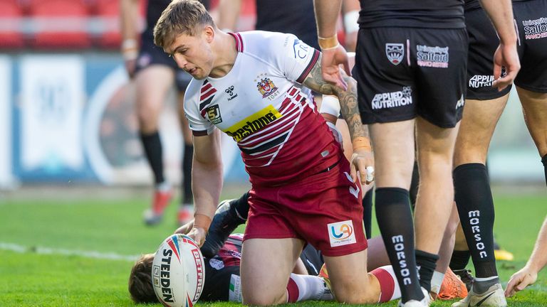 Wigan's Sam Powell scores a try against Salford