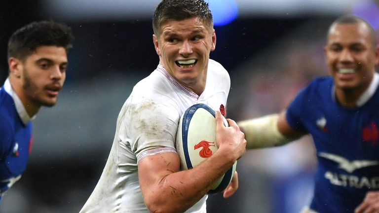Owen Farrell of England is tackled Boris Palu of France