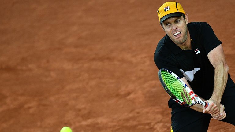 Sam Querrey of the US returns the ball to Russia's Andrey Rublev during their men's singles first round tennis match at the Simonne Mathieu court on Day 3 of The Roland Garros 2020 French Open tennis tournament in Paris on September 29, 2020