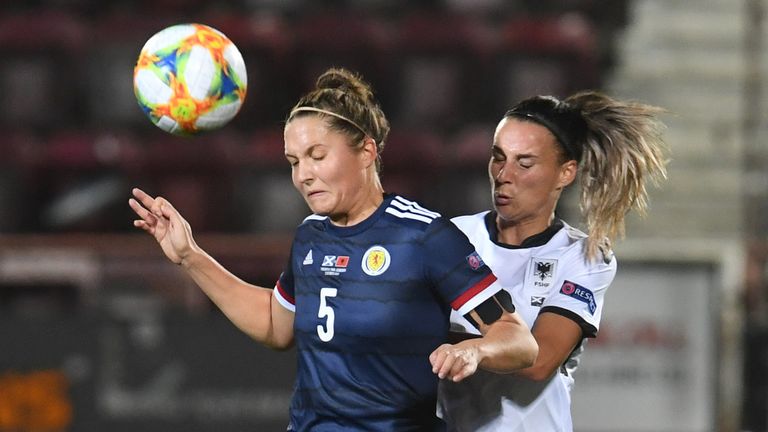 Hannah Godrey (L) in action with Albania's Zylfije Bajramaj during a UEFA Women's EURO 2021 qualifier between Scotland and Albania at Tynecastle