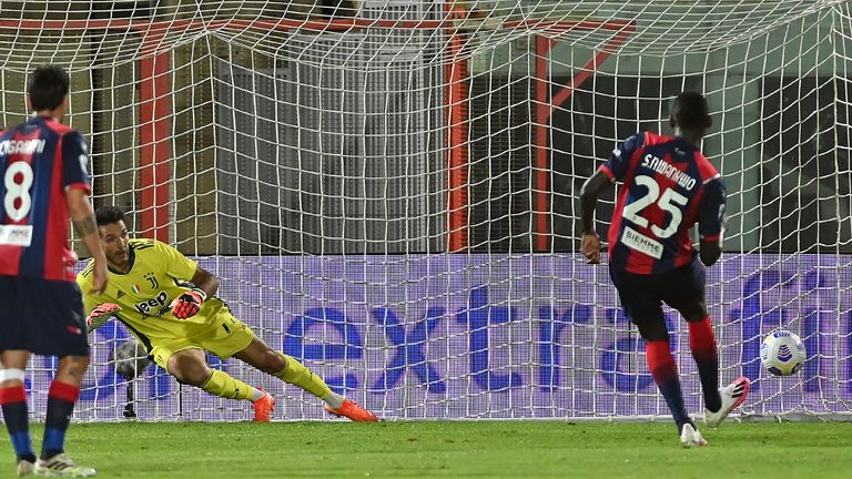 Simy  scores a goal from the penalty spot against Juventus goalkeeper Gianluigi Buffon