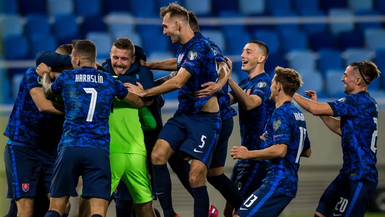 The Slovakia players celebrate their dramatic shootout victory