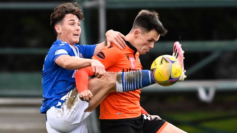Dundee United's Lawrence Shankland (right) competes with Danny McNamara