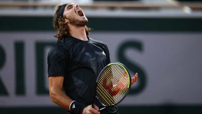 Greece&#39;s Stefanos Tsitsipas reacts as he plays against Serbia&#39;s Novak Djokovic during their men&#39;s singles semi-final tennis match on Day 13 of The Roland Garros 2020 French Open tennis tournament in Paris on October 9, 2020. 