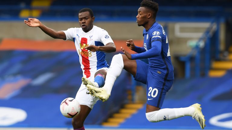 Tyrick Mitchell and Callum Hudson-Odoi in Premier League action at Stamford Bridge