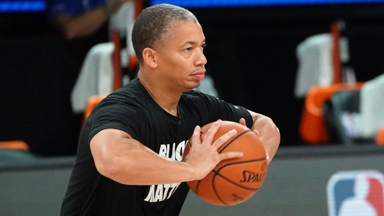 Tyronn Lue throws a pass during a Clippers&#39; warm-up during the NBA playoffs