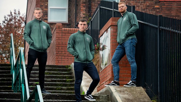 Dom Manfredi, Harry Smith and Joe Bullock model some of Wigan's new leisurewear range at the Blind Steps