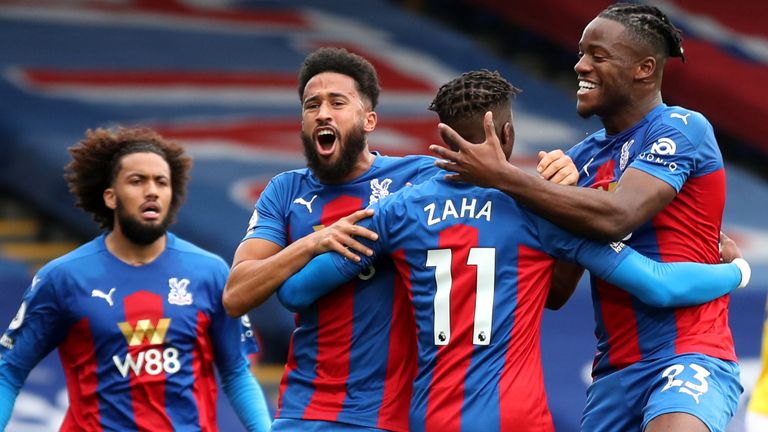 Wilfried Zaha celebrates scoring for Crystal Palace vs Brighton