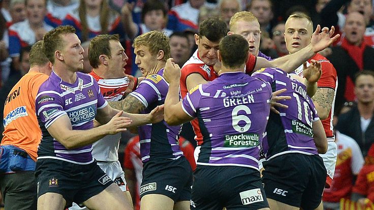 Wigan Warriors Ben Flower fights with St Helens Paul Wellens before being given a red card during the First Utility Super League Grand Final match at Old Trafford, Manchester. PRESS ASSOCIATION Photo. Picture date: Saturday October 11, 2014. See PA story RUGBYL Super. Photo credit should read Martin Rickett/PA Wire. RESTRICTIONS: Editorial use only. No commercial use. No false commercial association. No video emulation. No manipulation of images