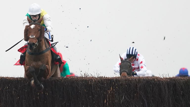 Cloth Cap and Tom Scudamore win the Ladbrokes Trophy