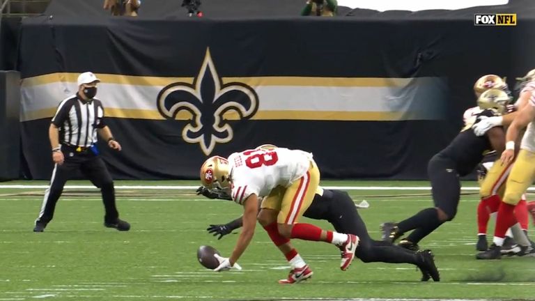 San Francisco 49ers quarterback Nick Mullens throws an 8-yard pass to tight end Jordan Reed