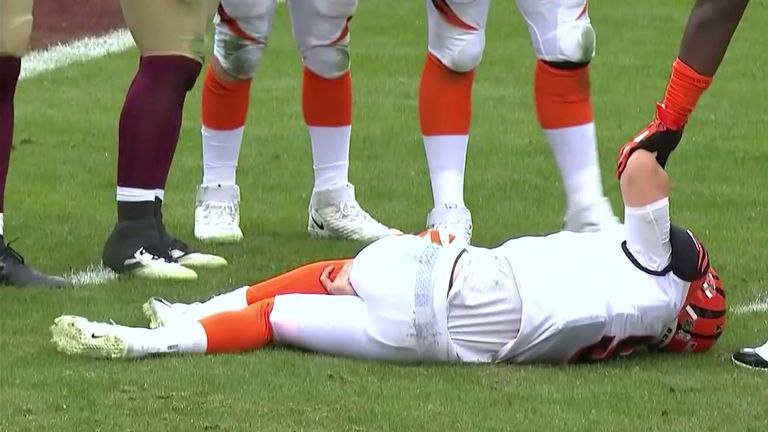 Joe Burrows is carted off after suffering a leg injury for the Cincinnati Bengals against Washington.