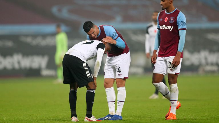 Ademola Lookman is consoled by Balbuena after the game
