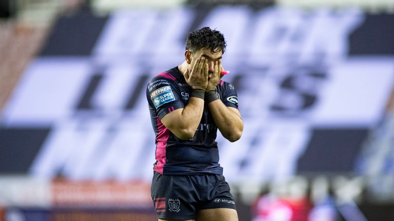 Andre Savelio of Hull FC is dejected after the game.