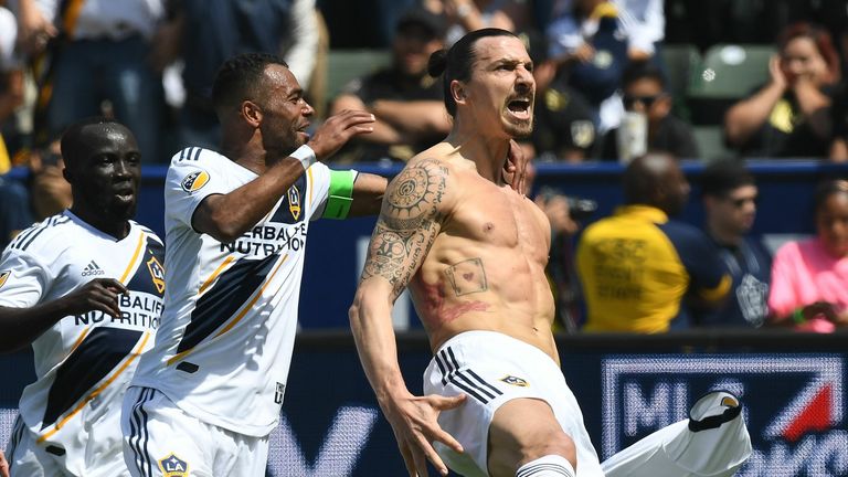Ashley Cole and Zlatan Ibrahimovic celebrate together for Los Angeles Galaxy