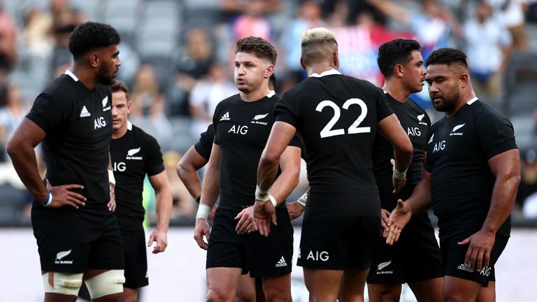 Beauden Barrett of the All Blacks looks on after losing