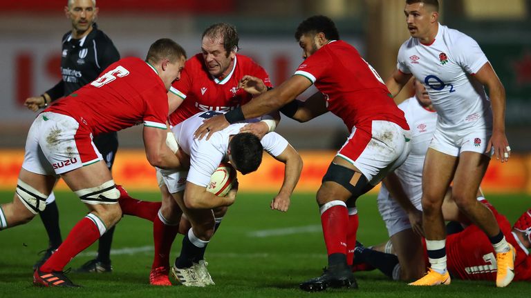 Shane Lewis-Hughes, Alun Wyn Jones and Taulupe Faletau wrap up Ben Youngs 