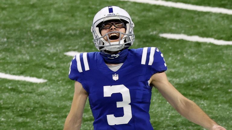 odrigo Blankenship #3 of the Indianapolis Colts celebrates with his teammates after kicking the game winning field goal to defeat the Green Bay Packers in overtime of the game at Lucas Oil Stadium