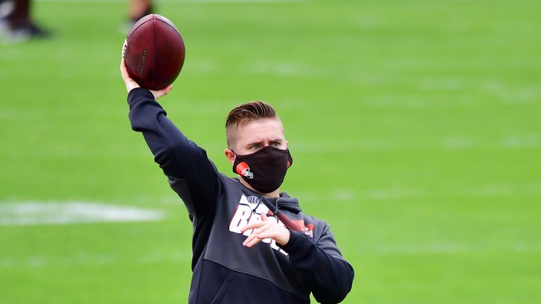 Tight ends coach Callie Brownson throws a ball during warm ups prior to their game against the Jacksonville Jaguars at TIAA Bank Field on November 29, 2020 in Jacksonville, Florida