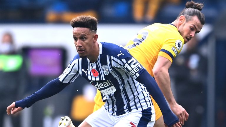 Callum Robinson is challenged by Gareth Bale