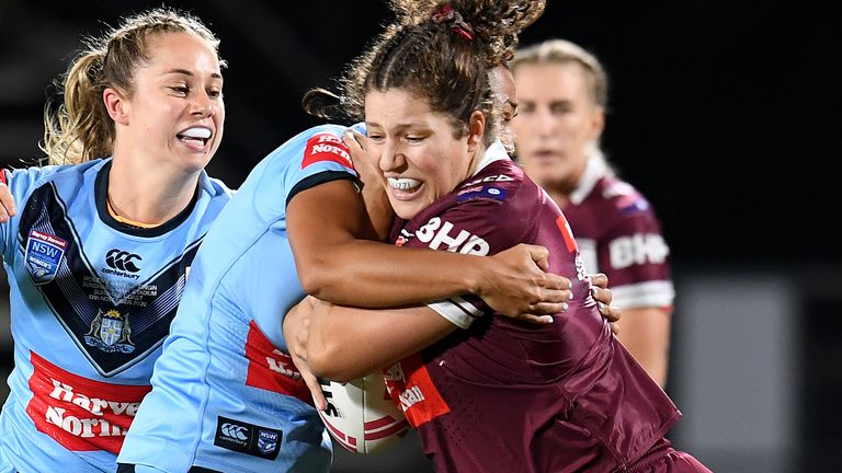 SUNSHINE COAST, AUSTRALIA - NOVEMBER 13: Chelsea Lenarduzzi of the Queensland Maroons is tackled during the Women's State of Origin match between Queensland and New South Wales at Sunshine Coast Stadium on November 13, 2020 in Sunshine Coast, Australia. (Photo by Dan Peled/Getty Images)