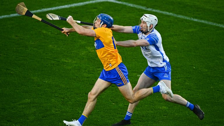 Shane O'Donnell of Clare in action against Shane McNulty of Waterford