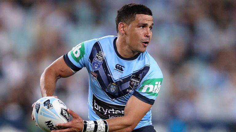 SYDNEY, AUSTRALIA - NOVEMBER 11: Cody Walker of the Blues offloads the ball during game two of the 2020 State of Origin series between the New South Wales Blues and the Queensland Maroons at ANZ Stadium on November 11, 2020 in Sydney, Australia. (Photo by Mark Kolbe/Getty Images)