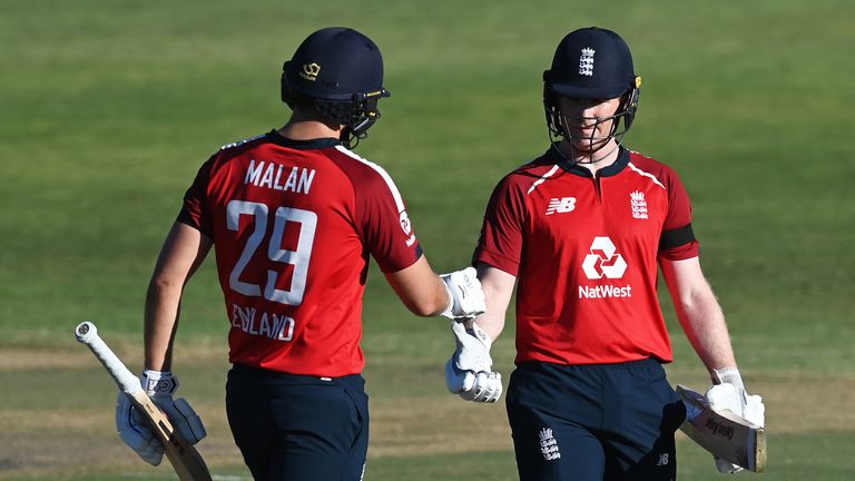 Eoin Morgan (R) congratulates Dawid Malan on his half-century at Paarl