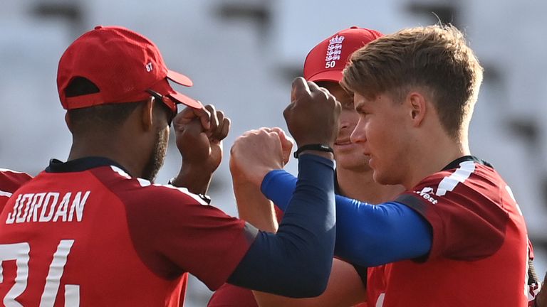 England players celebrate a wicket for Sam Curran against South Africa at Cape Town