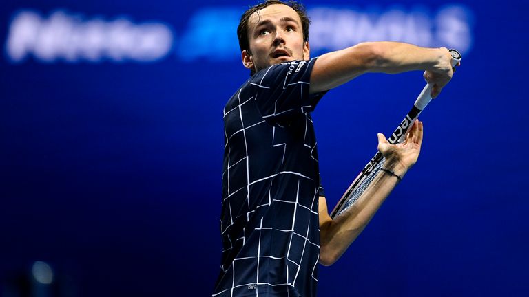 Daniil Medvedev of Russia hits a forehand against Alexander Zverev of Germany during Day 2 of the Nitto ATP World Tour Finals at The O2 Arena on November 16, 2020 in London, England.