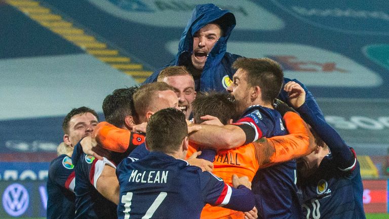 Scotland players celebrate after David Marshall's save secures victory in the penalty shoot out during the UEFA Euro 2020 Qualifier between Serbia and Scotland in Belgrade.