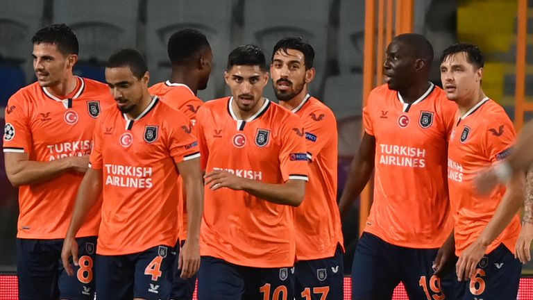 Istanbul Basaksehir players celebrate Demba Ba putting them ahead against Manchester United