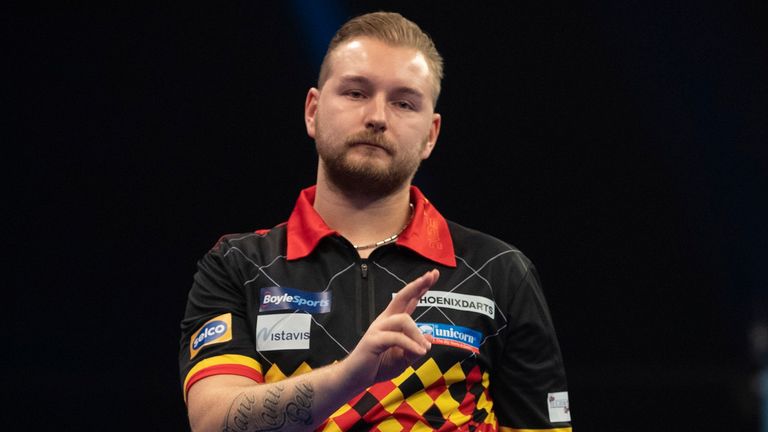 Dimitri Van Den Bergh remains on course for another televised title after a brilliant display saw off Jonny Clayton