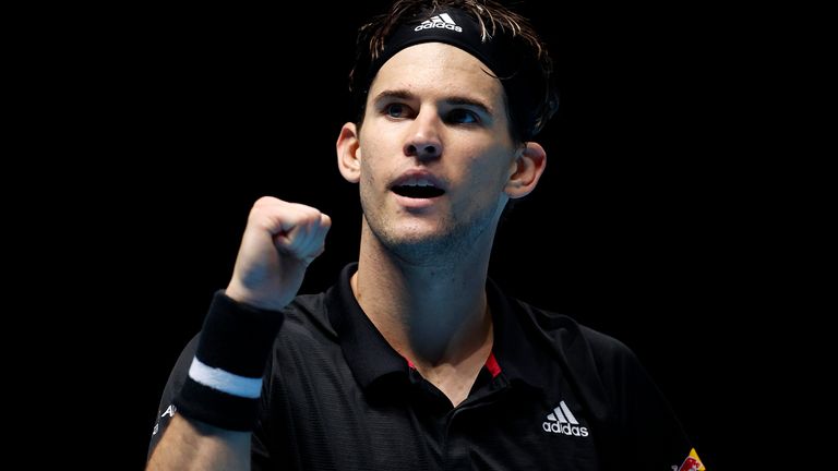Dominic Thiem of Austria celebrates winning match point during his singles match against Rafael Nadal of Spain during day three of the Nitto ATP World Tour Finals at The O2 Arena on November 17, 2020 in London, England.