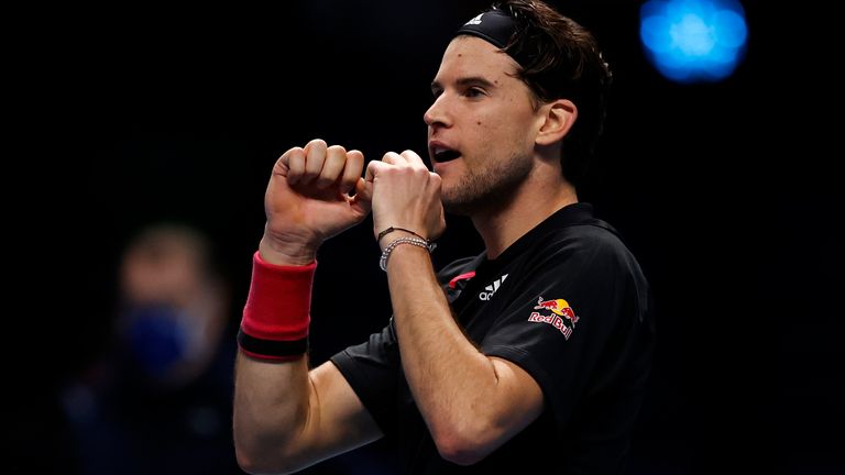 Dominic Thiem of Austria celebrates winning match point during his singles semi final match against Novak Djokovic of Serbia during day seven of the Nitto ATP World Tour Finals at The O2 Arena on November 21, 2020 in London, England
