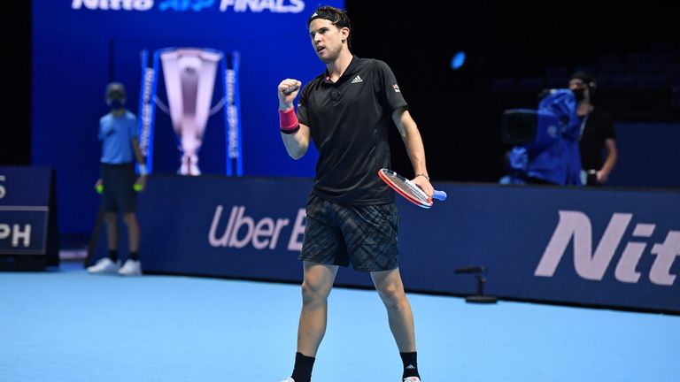Dominic Thiem reacts to taking it to 6-5 in the third set against Serbia's Novak Djokovic during their men's singles semi-final match on day seven of the ATP World Tour Finals tennis tournament at the O2 Arena in London on November 21, 2020.