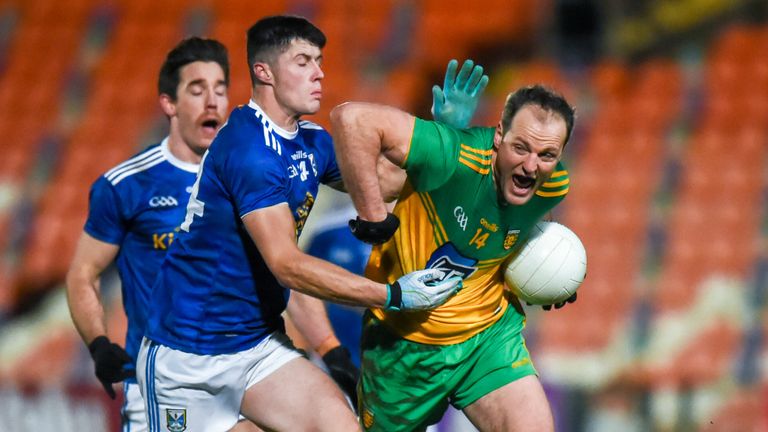 Michael Murphy of Donegal in action against James Smith of Cavan during the Ulster final