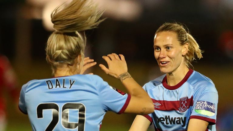 Emily Van Egmond is congratulated by Rachel Daly for her opening goal