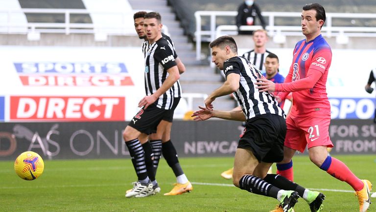 Newcastle United's Fedrico Fernandez scores a own goal against Chelsea