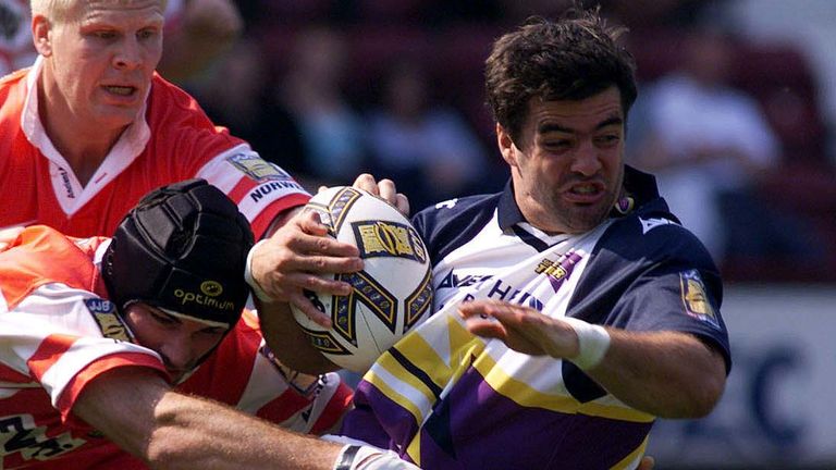 Pix: Simon Wilkinson, Gateshead v Wigan at Edinburgh, 1/08/99..COPYWRIGHT PICTURE>>SIMON WILKINSON>>01943 436649>>..Wigan's centre Danny Moore (skullcap) and forward Mick Cassidy attempt to tackle Gateshead's Brian Carney.