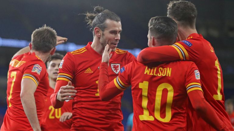 Harry Wilson celebrates scoring against Finland with Gareth Bale