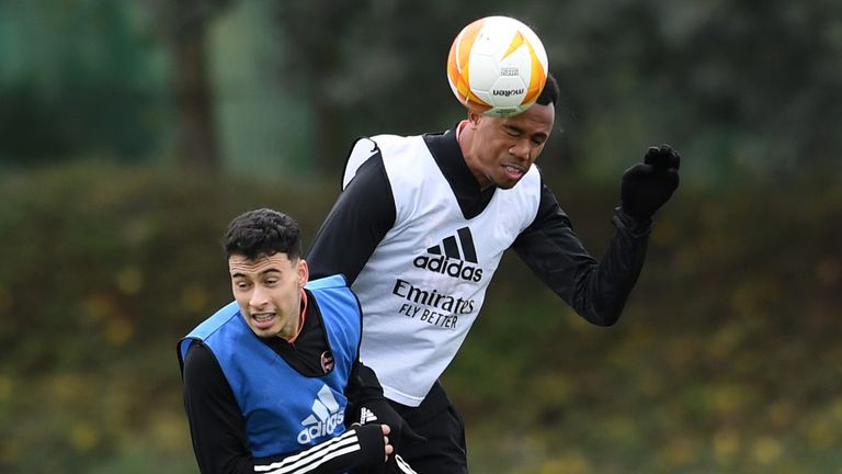 Arsenal&#39;s Gabriel goes up for a header in training