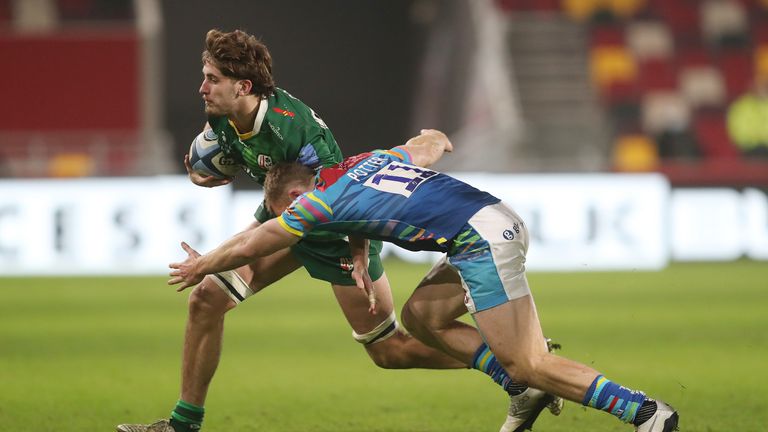 Jack Cooke is tackled by Leicester Tigers' Harry Potter