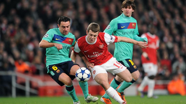 Jack Wilshere (Arsenal) Xavi (Barca). Arsenal 2:1 Barcelona. UEFA Champions League. Round 16, 1st Leg. Emirates Stadium, 16/2/11. Credit : Arsenal football Club / David Price.