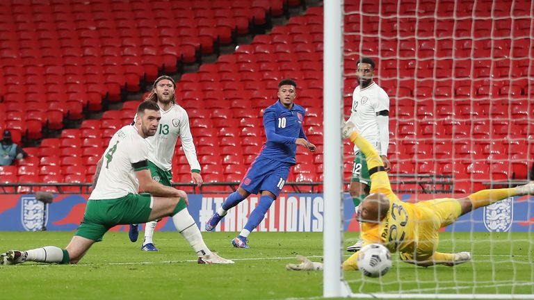 Sancho's precise shot finds the bottom corner to stretch England's lead