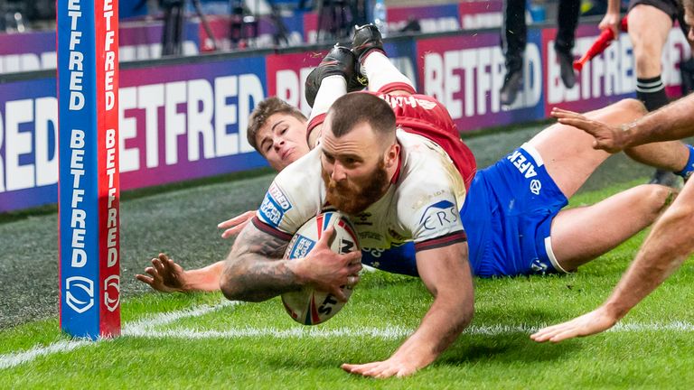 Picture by Allan McKenzie/SWpix.com - 27/11/2020 - Rugby League - Betfred Super League Grand Final - Wigan Warriors v St Helens - KC Stadium, Kingston upon Hull, England - Wigan's Jake Bibby scores a try against St Helens.