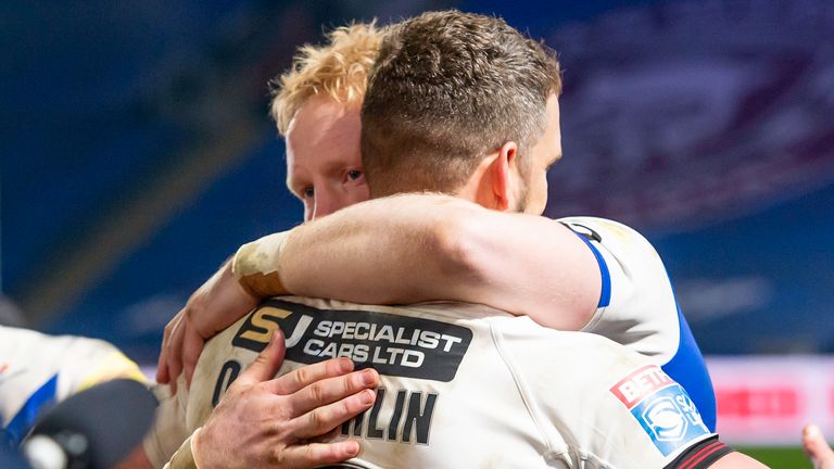 Picture by Allan McKenzie/SWpix.com - 27/11/2020 - Rugby League - Betfred Super League Grand Final - Wigan Warriors v St Helens - KC Stadium, Kingston upon Hull, England - St Helens's James Graham hugs Wigan's Sean O'Loughlin as both players careers ended after the game.