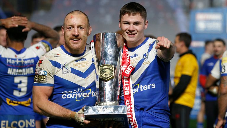 Picture by Ed Sykes/SWpix.com - 27/11/2020 - Rugby League - Betfred Super League Grand Final - Wigan Warriors v St Helens - KC Stadium, Kingston upon Hull, England - St Helens' James Roby and Jack Welsby celebrate with the trophy after the game