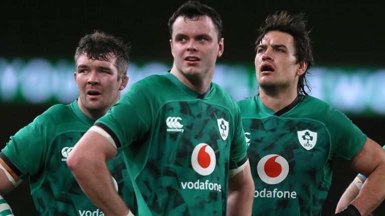 Ireland's flanker Peter O'Mahony (L), Ireland's lock James Ryan (C) and Ireland's lock Quinn Roux (R) look up at the big screen during the Autumn Nations Cup international rugby union match between Ireland and Wales