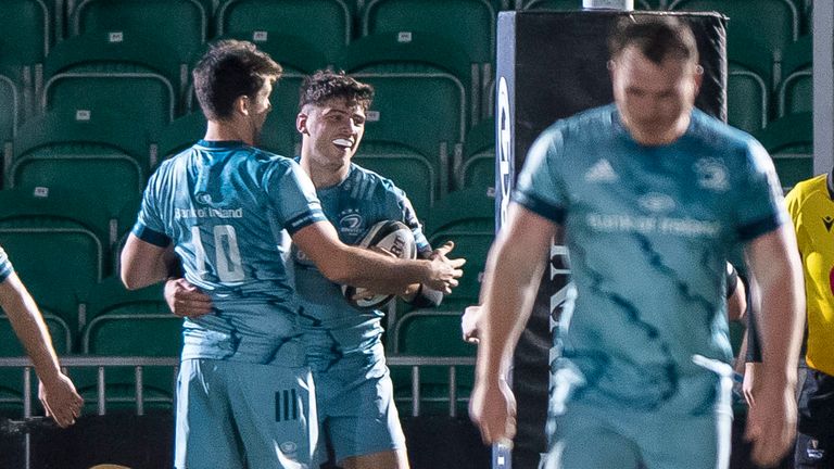 Leinster's Jimmy O'Brien celebrates scoring a try with Harry Byrne.